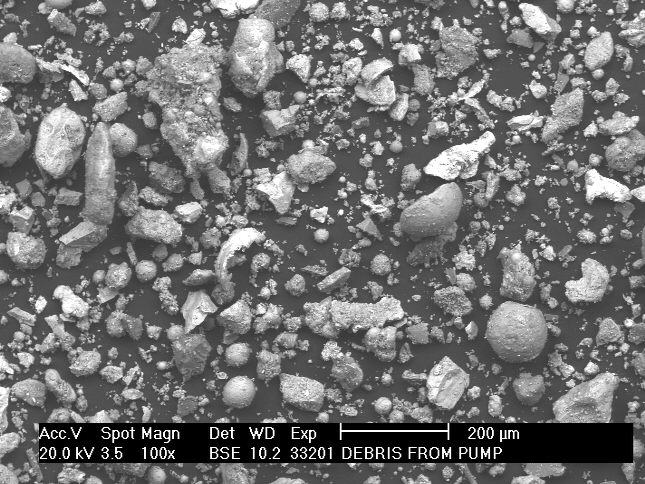 Water pump debris identification by SEM