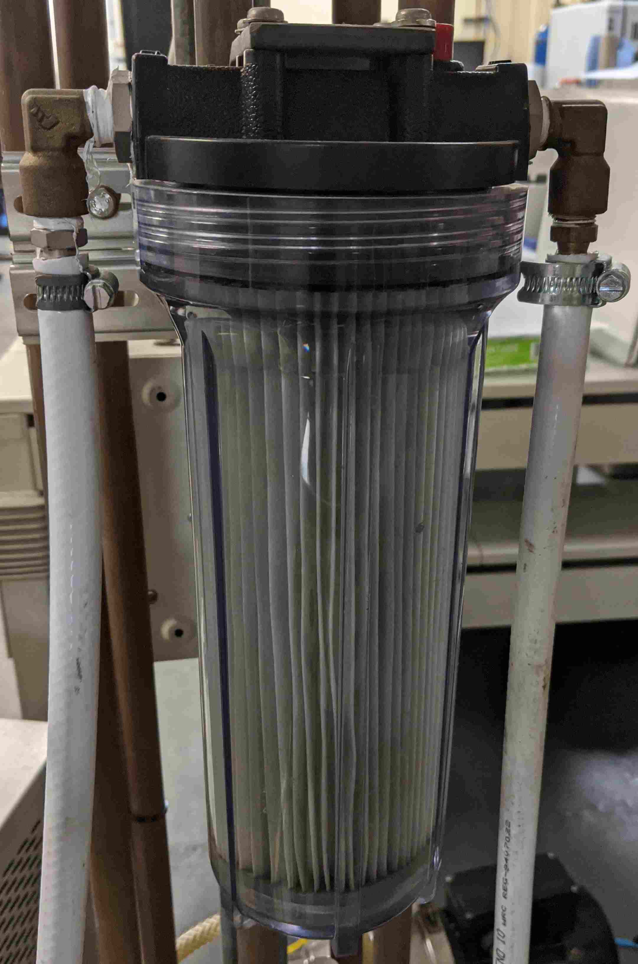 Pleated fibre Water system filter cartridge to collect particles and debris