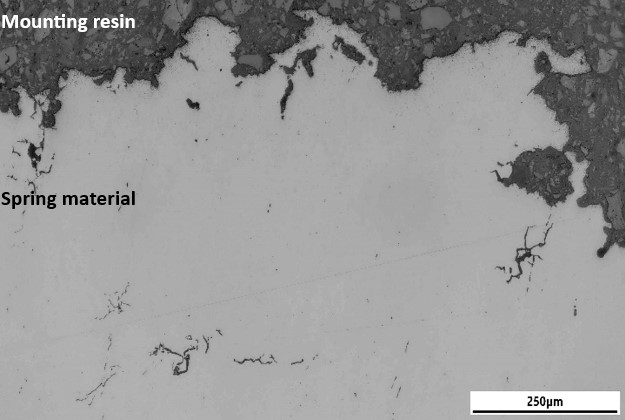 Metallography showing hydrogen induced cracking steel spring